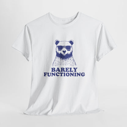 Hanging white T-shirt with a blue bear graphic and "Barely Functioning" text. Part of the Vivid Divergence Sensory Friendly Unisex Tees Range.