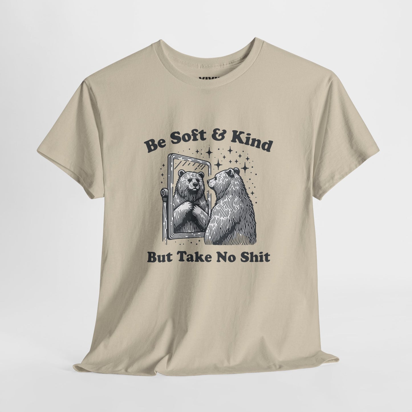 Hanging view of beige T-shirt featuring sketched bear standing tall with the phrase "Be Soft & Kind But Take No Shit." Equal parts gentle and feral. Part of the Vivid Divergence Memewear Collection!
