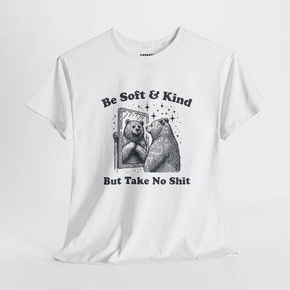 Hanging view of white T-shirt featuring sketched bear standing tall with the phrase "Be Soft & Kind But Take No Shit." Equal parts gentle and feral. Part of the Vivid Divergence Memewear Collection!

