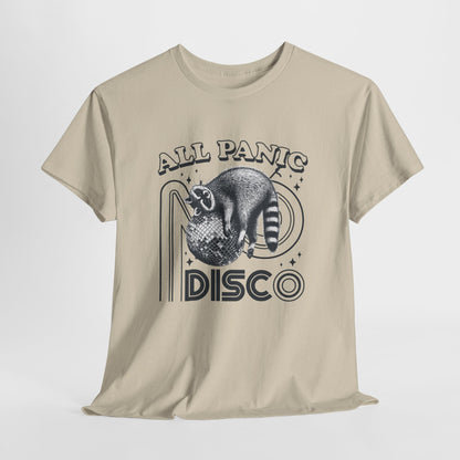 Hanging beige T-shirt featuring "All Panic No Disco" text with a raccoon illustration inside a disco ball. Part of the Vivid Divergence Sensory Friendly Unisex Tees Range.