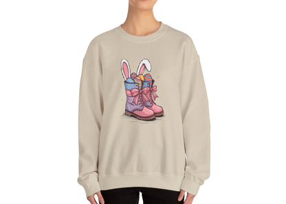 Woman in beige sweater jumper with pink cowgirl boots, bunny ears, and Easter eggs. Part of the Vivid Divergence Sensory Friendly Unisex Sweater Jumper Range.
