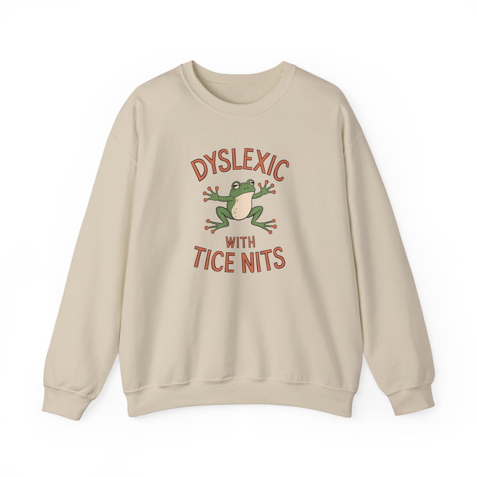 Front view of a beige sweatshirt featuring a cartoon frog and the text "Dyslexic with Tice Nits" in bold letters. Part of the Vivid Divergence Sensory Friendly Unisex Sweater Jumper Range.