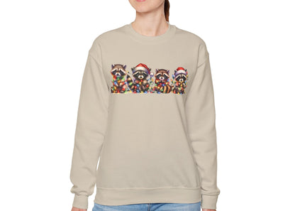 Model wearing a beige sweatshirt featuring a festive illustration of raccoons in Christmas attire causing holiday chaos. Part of the Vivid Divergence Sensory Friendly Unisex Sweater Jumper Range.