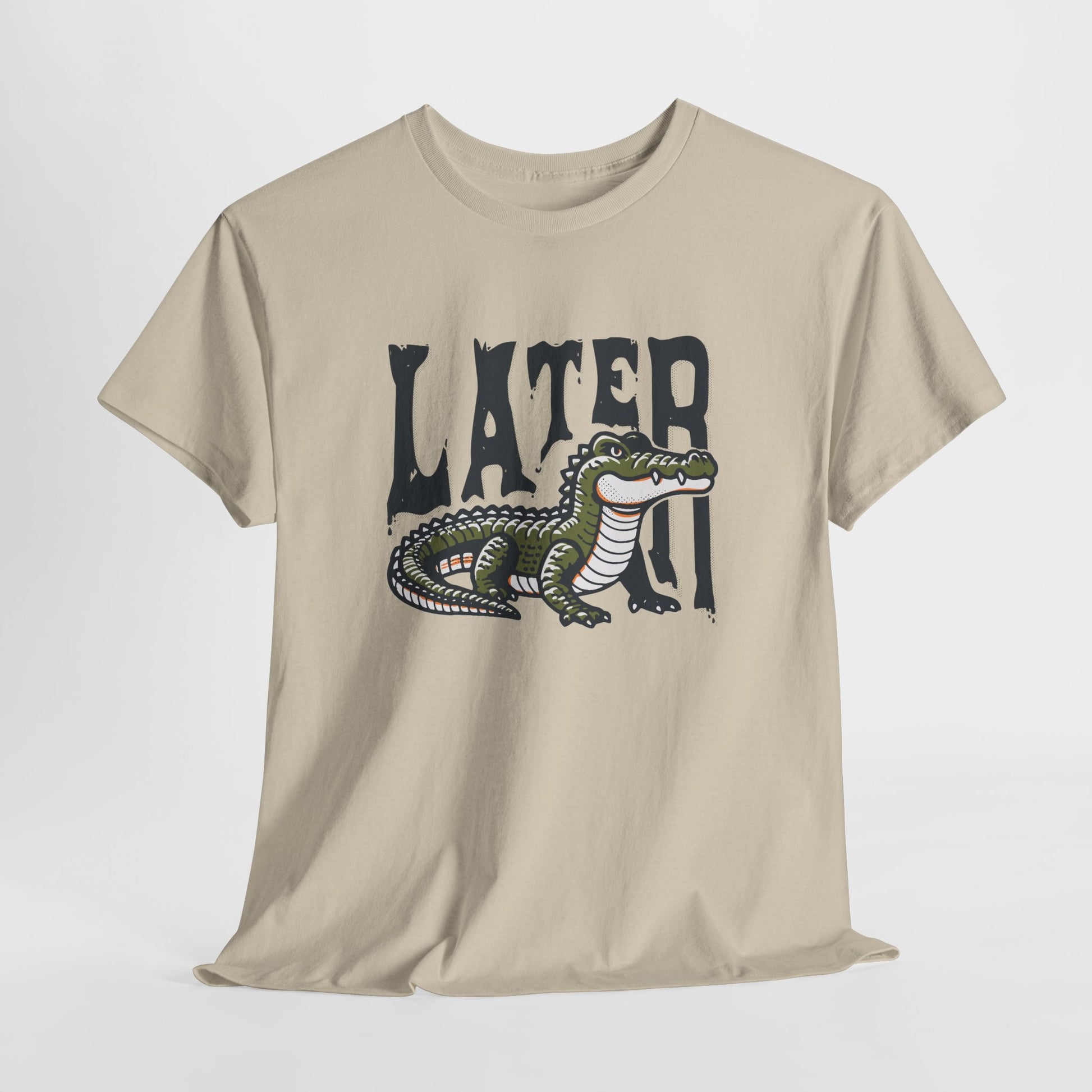 Hanging beige T-shirt featuring a "Later Alligator" design with a detailed alligator illustration. Part of the Vivid Divergence Sensory Friendly Unisex Tees Range.