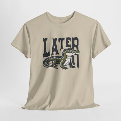 Hanging beige T-shirt featuring a "Later Alligator" design with a detailed alligator illustration. Part of the Vivid Divergence Sensory Friendly Unisex Tees Range.