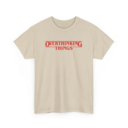 Front view of a beige T-shirt with "Overthinking Things" in red text, parodying Stranger Things. Part of the Vivid Divergence Sensory Friendly Unisex Tees Range.