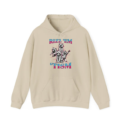 Front view of a beige hoodie featuring a raccoon illustration with the text "Rizz 'Em 'Tism" in bold, colorful letters. Part of the Vivid Divergence Sensory Friendly Unisex Hoodie Range.