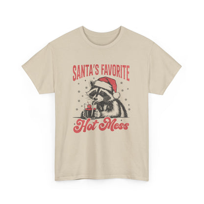 Front view of a beige T-shirt featuring a "Santa's Favorite Hot Mess" design with a festive raccoon wearing a Santa hat. Part of the Vivid Divergence Sensory Friendly Unisex Tees Range.
