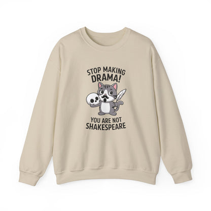 Front view of a beige sweatshirt featuring a cartoon cat holding a skull with the text "Stop Making Drama! You Are Not Shakespeare." Part of the Vivid Divergence Sensory Friendly Unisex Sweater Jumper Range.