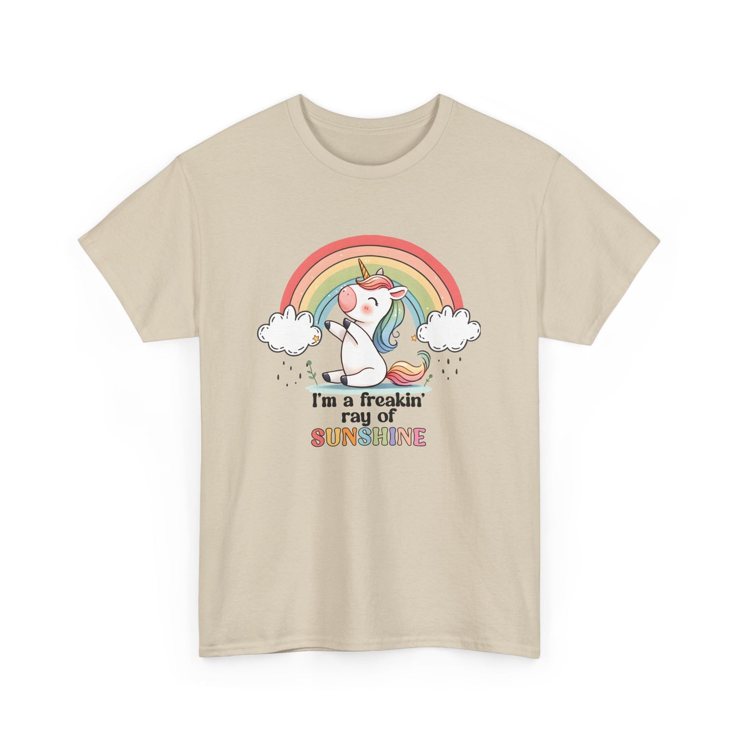 Front view of a beige T-shirt featuring a rainbow and unicorn graphic with the text "I'm A Freakin Ray Of Sunshine." Part of the Vivid Divergence Sensory Friendly Unisex Tees Range.