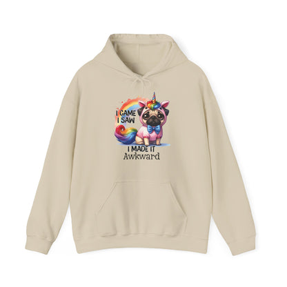 Front view of a beige hoodie featuring a colorful unicorn pug with the text "I Came, I Saw, I Made It Awkward." Part of the Vivid Divergence Sensory Friendly Unisex Hoodie Range.
