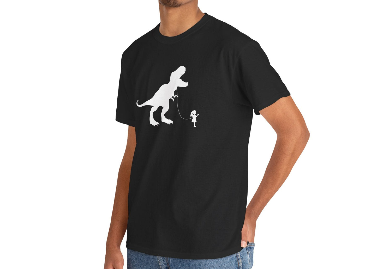Model wearing a black T-shirt featuring a white silhouette of a girl walking a T-Rex on a leash. Part of the Vivid Divergence Sensory Friendly Unisex Tees Range.
