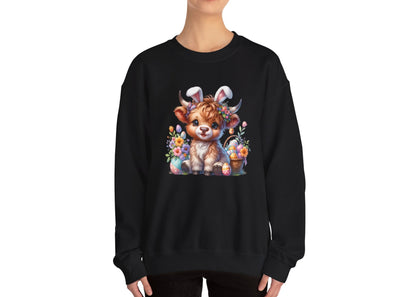 Woman in black sweater jumper with festive Highland cow and Easter flower print. Part of the Vivid Divergence Sensory Friendly Unisex Sweater Jumper Range.
