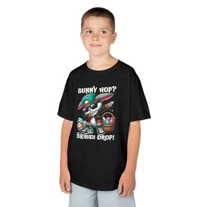 Black Easter T-shirt worn by a boy, featuring skibidi bunny and fun text. A fun, bold shirt radiating skibidi sigma rizz energy for Easter. Hop into the season in style and shop Easter shirts online today!
