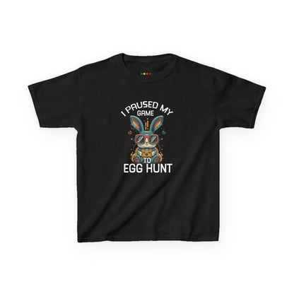 Black kids' T-shirt featuring "I Paused My Game to Egg Hunt" text with a cool gaming-inspired Easter bunny, perfect for young gamers. Hop into the season in style and shop Easter shirts online today!