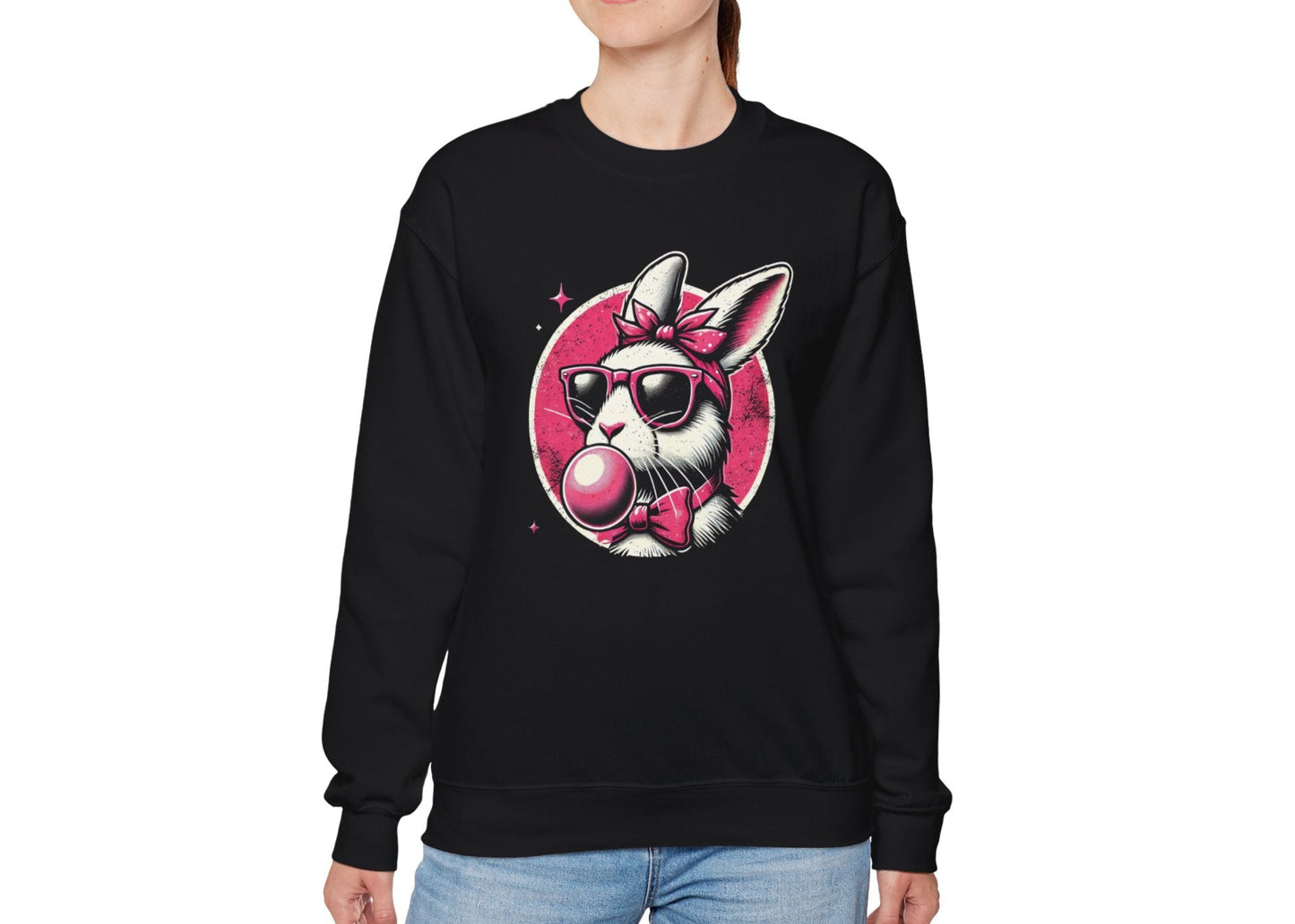 Woman wearing black sweater jumper with retro Easter bunny blowing pink bubblegum. Part of the Vivid Divergence Sensory Friendly Unisex Sweater Jumper Range.
