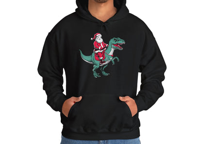 Model wearing a black hoodie featuring Santa riding a dinosaur, blending holiday and prehistoric fun. Part of the Vivid Divergence Sensory Friendly Unisex Hoodie Range.