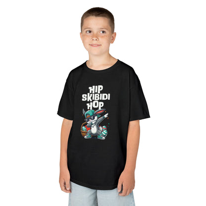 Child wearing a black Easter T-shirt featuring a dabbing Skibidi bunny with "Hip Skibidi Hop" text, a cool holiday look for kids. Hop into the season in style and shop Easter shirts online today!