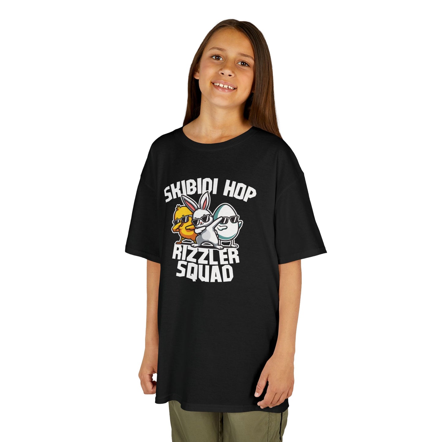 Child wearing a black Easter T-shirt featuring a "Skibidi Hop Rizzler Squad" meme design, perfect for a cool Easter look. Hop into the season in style and shop Easter shirts online today!