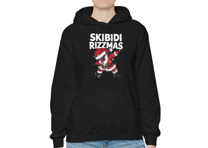 Model wearing a black "Skibidi Rizzmas" hoodie with a dabbing Santa design. Part of the Vivid Divergence Sensory Friendly Unisex Hoodies Range.