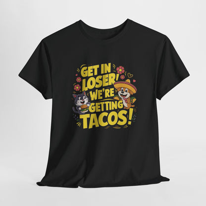 Hanging front view of a black T-shirt with colorful text and illustrations of cute animals in a car that reads "Get In Loser, We're Getting Tacos!" Part of the Vivid Divergence Sensory Friendly Unisex Tees Range.