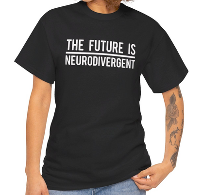 Model wearing a black T-shirt with the text "The Future is Neurodivergent" in bold white letters. Part of the Vivid Divergence Sensory Friendly Unisex Tees Range.
