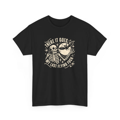 Front view of a black T-shirt with the text "There It Goes, My Last Flying F*ck" and a graphic of a flying bird carrying a banner. Part of the Vivid Divergence Sensory Friendly Unisex Tees Range.