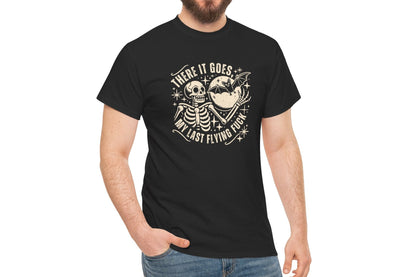 Model wearing a black T-shirt with the text "There It Goes, My Last Flying F*ck" and a graphic of a flying bird carrying a banner. Part of the Vivid Divergence Sensory Friendly Unisex Tees Range.