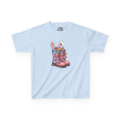 Light blue kids' T-shirt featuring cowgirl boots filled with Easter eggs and bunny ears, a fun and festive holiday look. Hop into the season in style and shop Easter shirts online today!