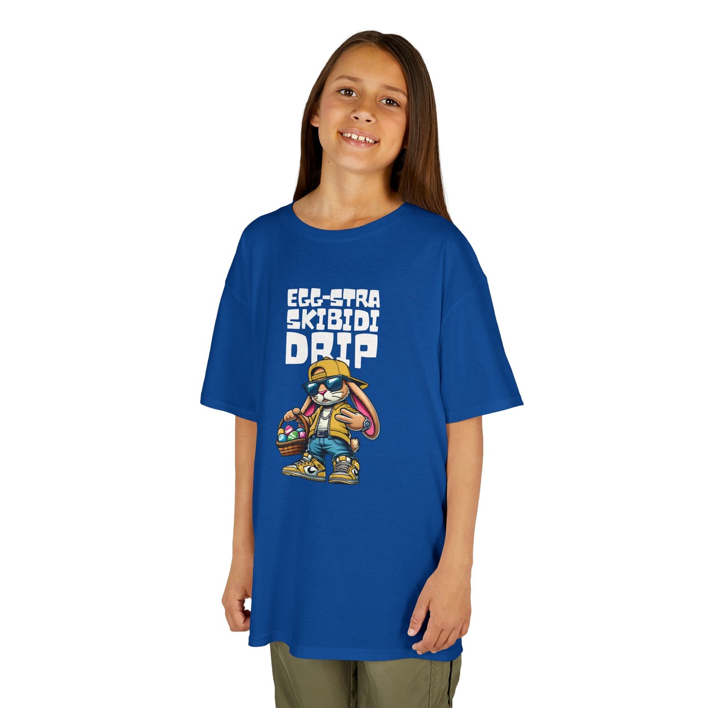 Child wearing a blue Easter T-shirt featuring a Skibidi bunny with "Egg-Stra Skibidi Drip" text, perfect for fans of viral trends. Hop into the season in style and shop Easter shirts online today!