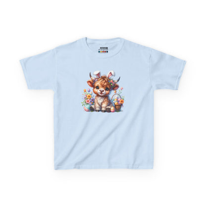 Light blue kids' T-shirt showcasing a sweet Highland cow surrounded by colorful Easter eggs and florals, a charming choice for spring. Hop into the season in style and shop Easter shirts online today!