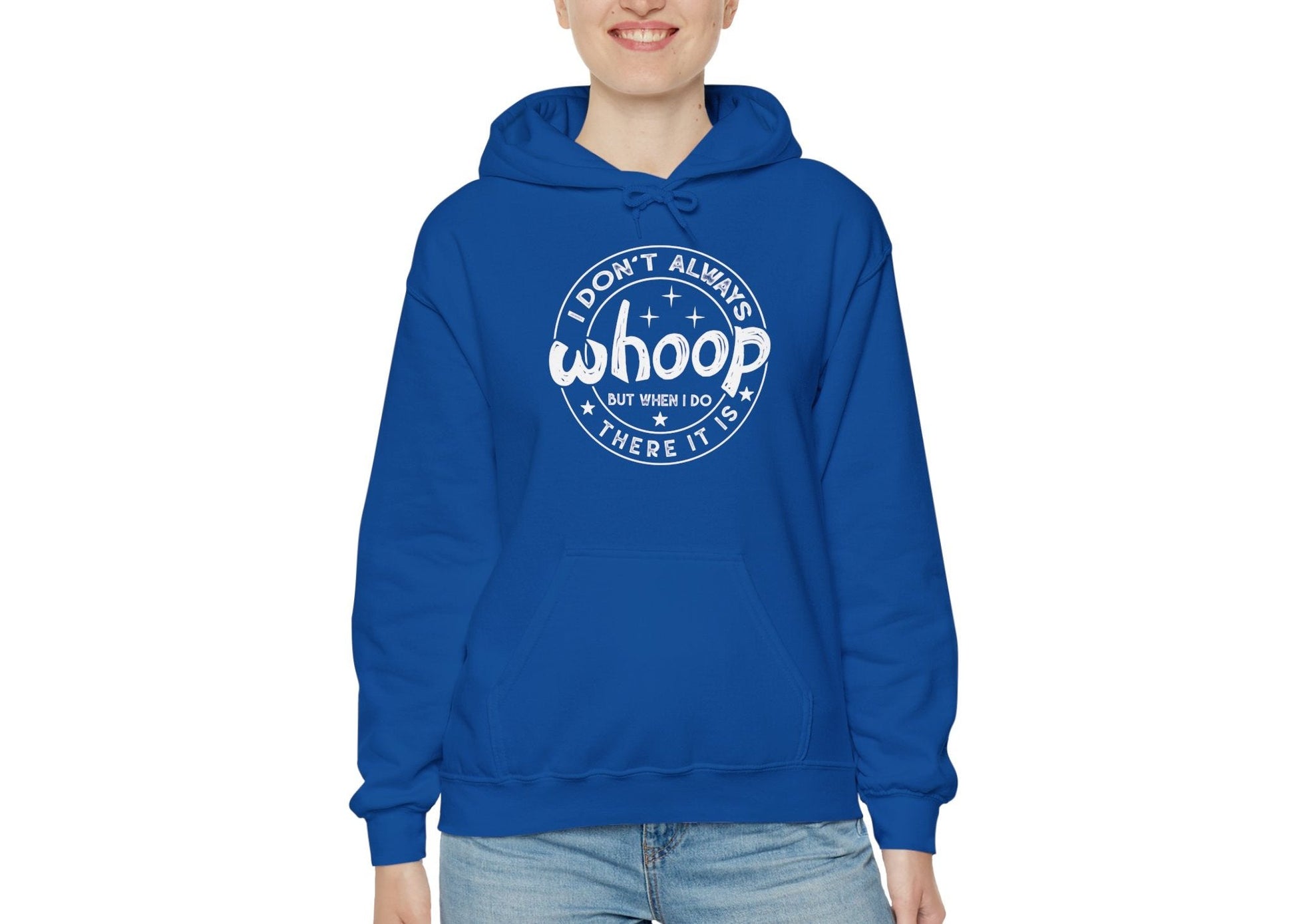 Model wearing a blue hoodie featuring the text "I Don’t Always Whoop, But When I Do, There It Is" in a circular badge design. Part of the Vivid Divergence Sensory Friendly Unisex Hoodie Range.