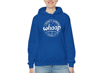 Model wearing a blue hoodie featuring the text "I Don’t Always Whoop, But When I Do, There It Is" in a circular badge design. Part of the Vivid Divergence Sensory Friendly Unisex Hoodie Range.