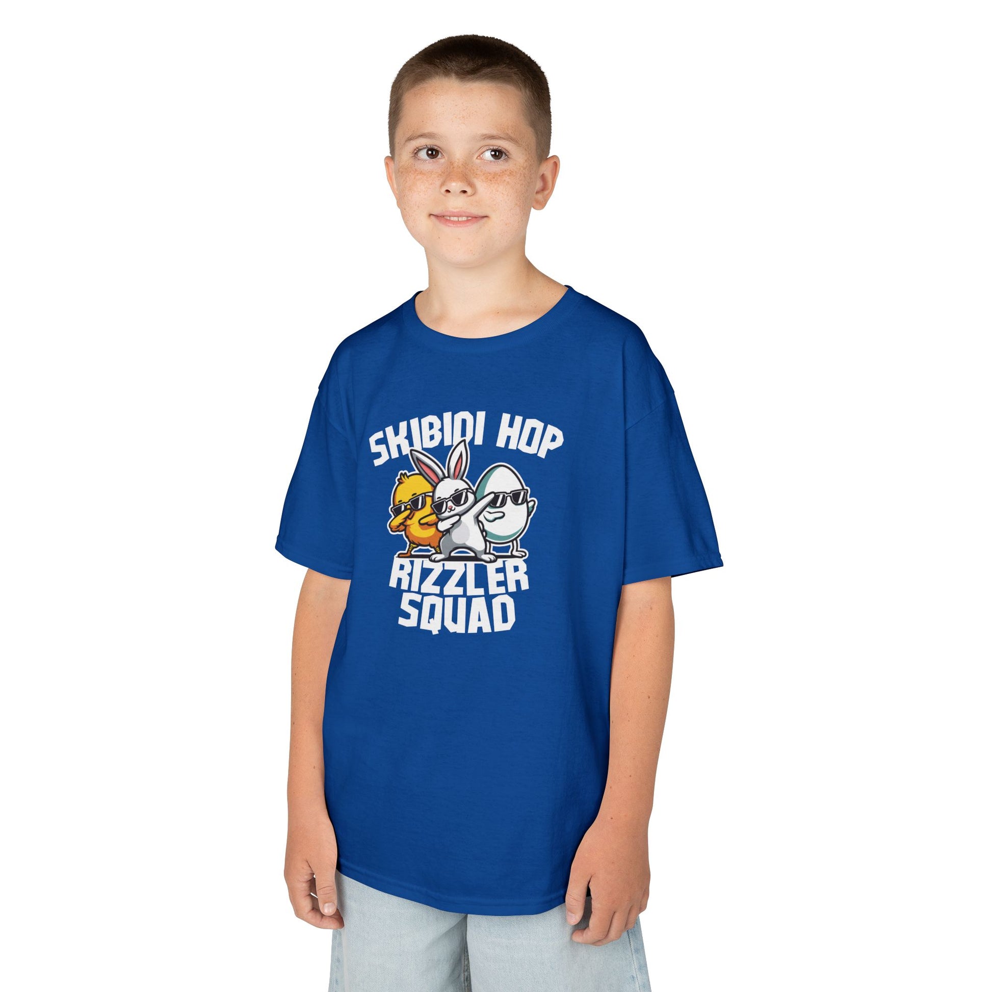 Child wearing a blue Easter T-shirt with "Skibidi Hop Rizzler Squad" meme text, a trendy and fun holiday outfit. Hop into the season in style and shop Easter shirts online today!