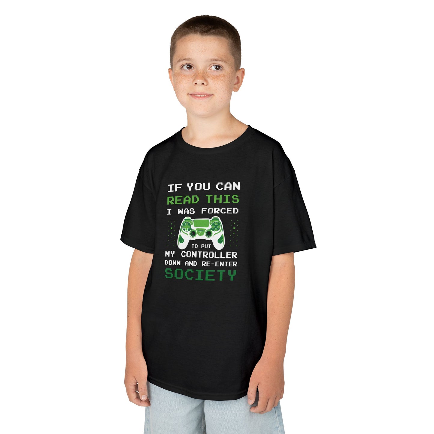 Boy wearing a black "Forced to Put My Controller Down" kids T-shirt with a green game controller graphic and humorous text. Part of the Vivid Divergence Sensory Friendly Kids Shirts Range. The perfect T-shirt for sensory-sensitive kids and comes with a Sensory Satisfaction Promise.