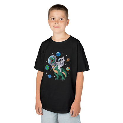 Boy wearing a black "Jurassic Space Jam" kids T-shirt with a dinosaur and astronaut floating among planets. Part of the Vivid Divergence Sensory Friendly Kids Shirts Range. The perfect T-shirt for sensory-sensitive kids and comes with a Sensory Satisfaction Promise.