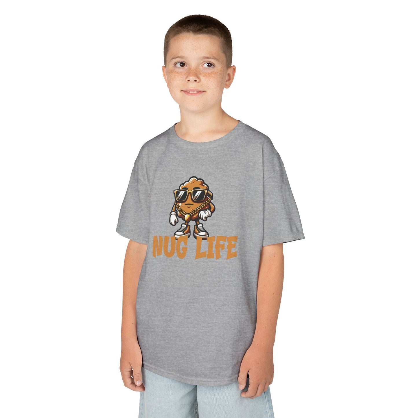 Boy wearing a gray "Nug Life" chicken nuggets kids T-shirt with a cool cartoon chicken nugget wearing sunglasses. Part of the Vivid Divergence Sensory Friendly Kids Shirts Range. The perfect T-shirt for sensory-sensitive kids and comes with a Sensory Satisfaction Promise.