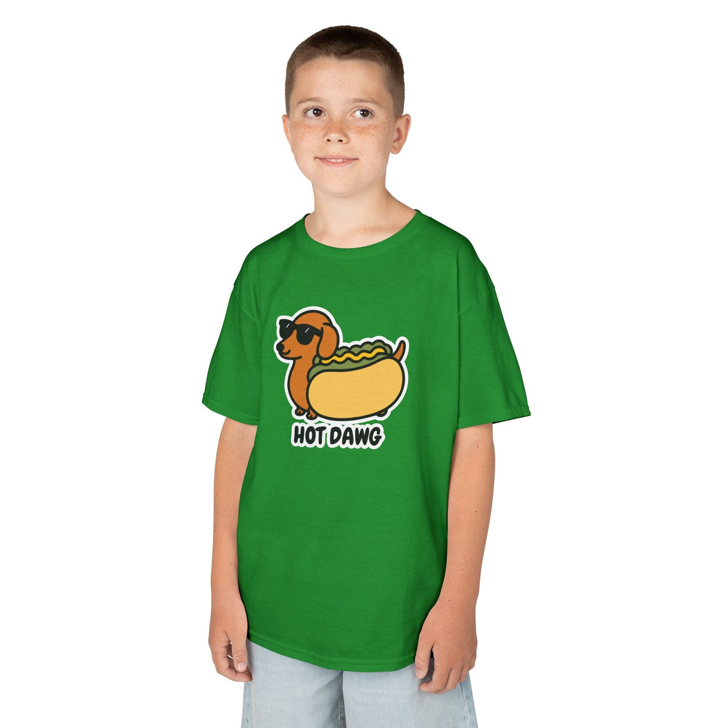Boy wearing a green "Hot Dawg" kids T-shirt with a cartoon dachshund in a hot dog bun. Part of the Vivid Divergence Sensory Friendly Kids Shirts Range. The perfect T-shirt for sensory-sensitive kids and comes with a Sensory Satisfaction Promise.