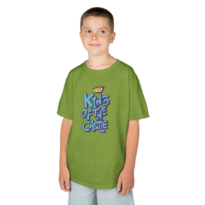 Boy wearing a green "King Of The Castle" kids T-shirt with bold blue text and a crown graphic. Part of the Vivid Divergence Sensory Friendly Kids Shirts Range. The perfect T-shirt for sensory-sensitive kids and comes with a Sensory Satisfaction Promise.
