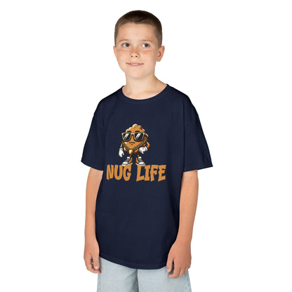 Boy wearing a navy blue "Nug Life" chicken nuggets kids T-shirt with a cool cartoon chicken nugget wearing sunglasses. Part of the Vivid Divergence Sensory Friendly Kids Shirts Range. The perfect T-shirt for sensory-sensitive kids and comes with a Sensory Satisfaction Promise.