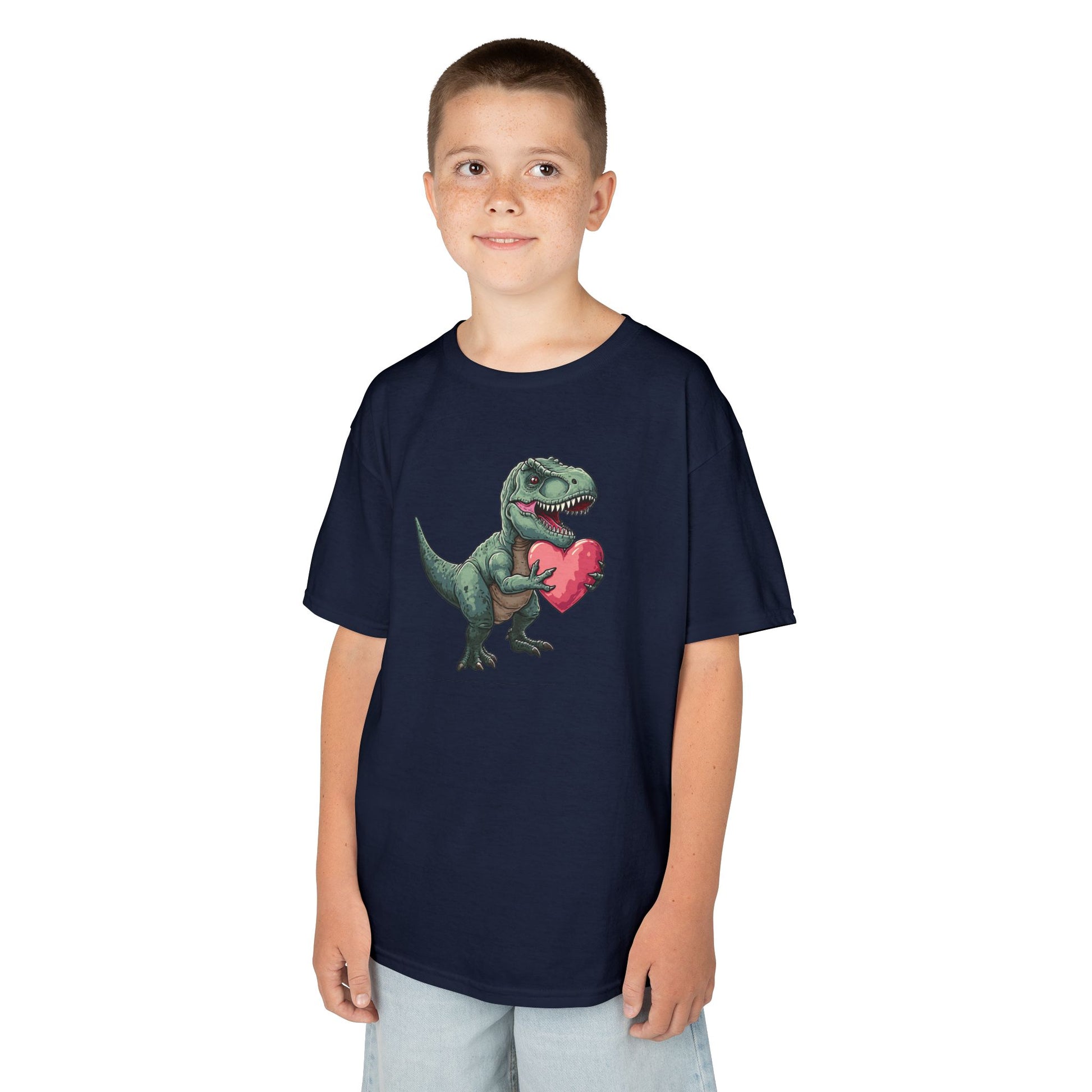 Boy wearing a navy blue T-Rex Love kids T-shirt with a cartoon dinosaur holding a heart. Part of the Vivid Divergence Sensory Friendly Kids Shirts Range. The perfect T-shirt for sensory-sensitive kids and comes with a Sensory Satisfaction Promise.