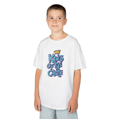 Boy wearing a white "King Of The Castle" kids T-shirt with bold blue text and a crown graphic. Part of the Vivid Divergence Sensory Friendly Kids Shirts Range. The perfect T-shirt for sensory-sensitive kids and comes with a Sensory Satisfaction Promise.