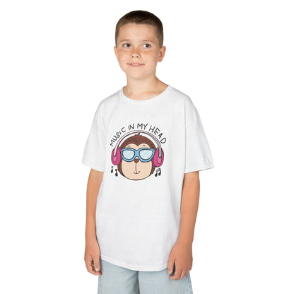 Boy wearing a white "Music In My Head" monkey kids T-shirt with a cartoon monkey wearing headphones. Part of the Vivid Divergence Sensory Friendly Kids Shirts Range. The perfect T-shirt for sensory-sensitive kids and comes with a Sensory Satisfaction Promise.