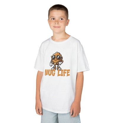 Boy wearing a white "Nug Life" chicken nuggets kids T-shirt with a cool cartoon chicken nugget wearing sunglasses. Part of the Vivid Divergence Sensory Friendly Kids Shirts Range. The perfect T-shirt for sensory-sensitive kids and comes with a Sensory Satisfaction Promise.
