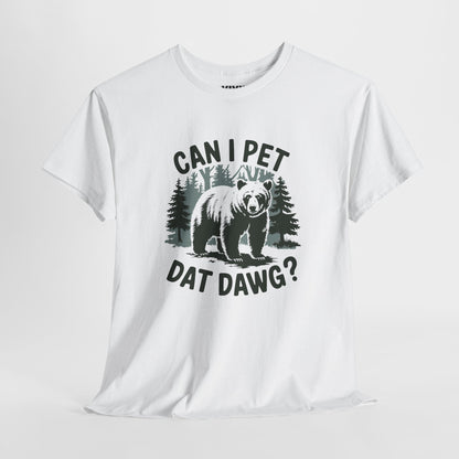 Angled view of white T-shirt showing graphic with trees and dog silhouette. Text reads “CAN I PET DAT DAWG?” in all caps. Part of the Vivid Divergence Memewear Collection!
