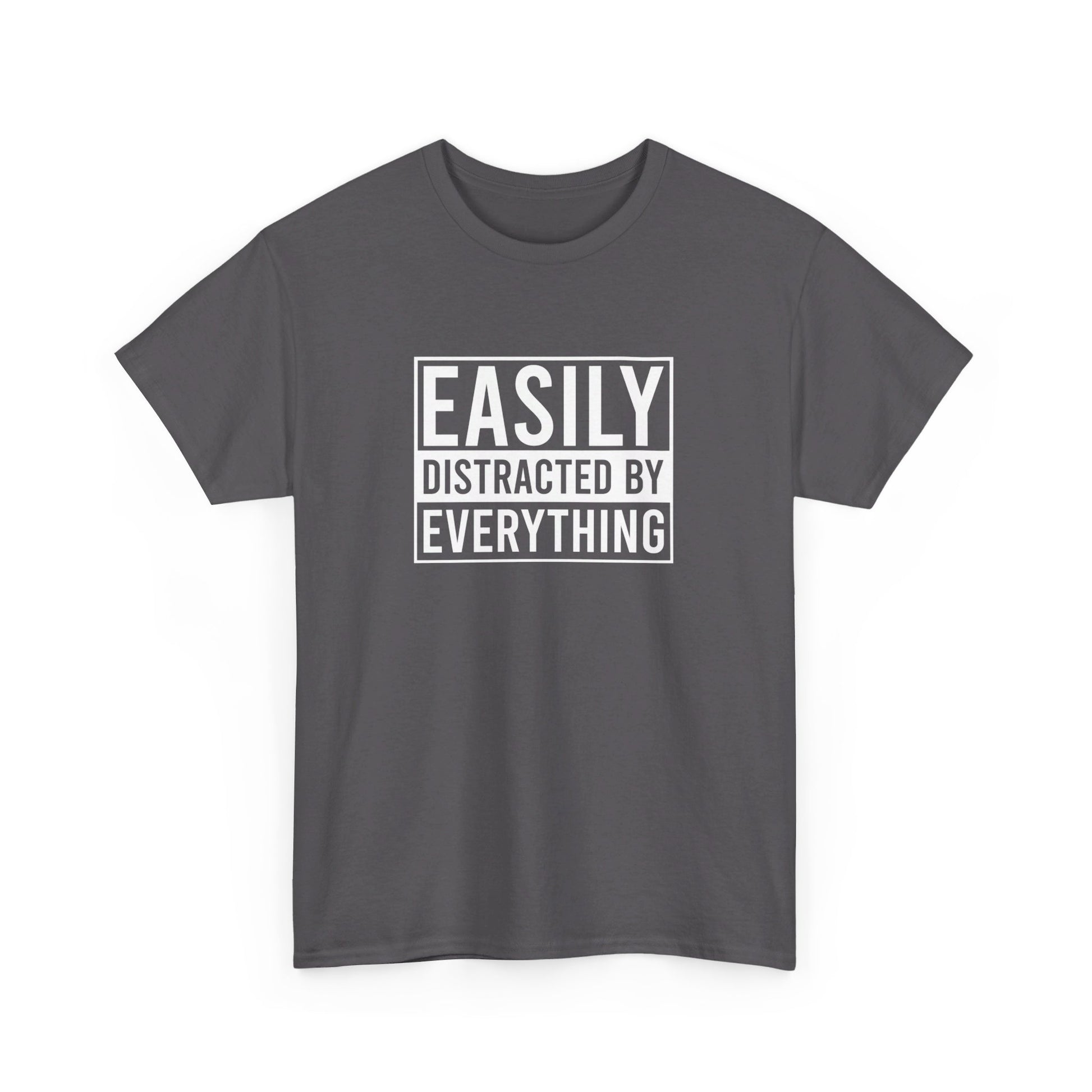 Front view of a dark gray T-shirt with the text "Easily Distracted by Everything" in bold white letters. Part of the Vivid Divergence Sensory Friendly Unisex Tees Range.