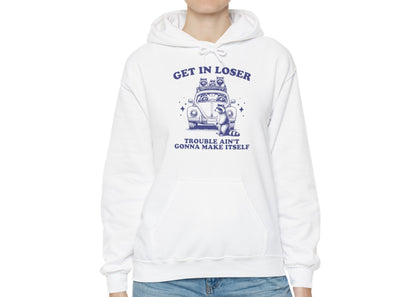 Front view of a white hoodie with "Get in Loser, Trouble Ain't Gonna Make Itself" in blue letters and a group of raccoons riding in a car. Part of the Vivid Divergence Sensory Friendly Unisex Hoodie Range.