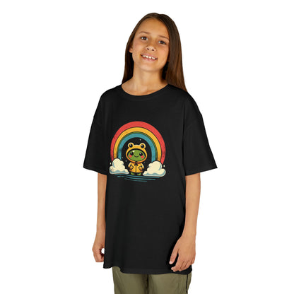 Girl wearing a black "Frog Under Rainbow" kids T-shirt with a cute frog sitting under a colorful rainbow. Part of the Vivid Divergence Sensory Friendly Kids Shirts Range. The perfect T-shirt for sensory-sensitive kids and comes with a Sensory Satisfaction Promise.