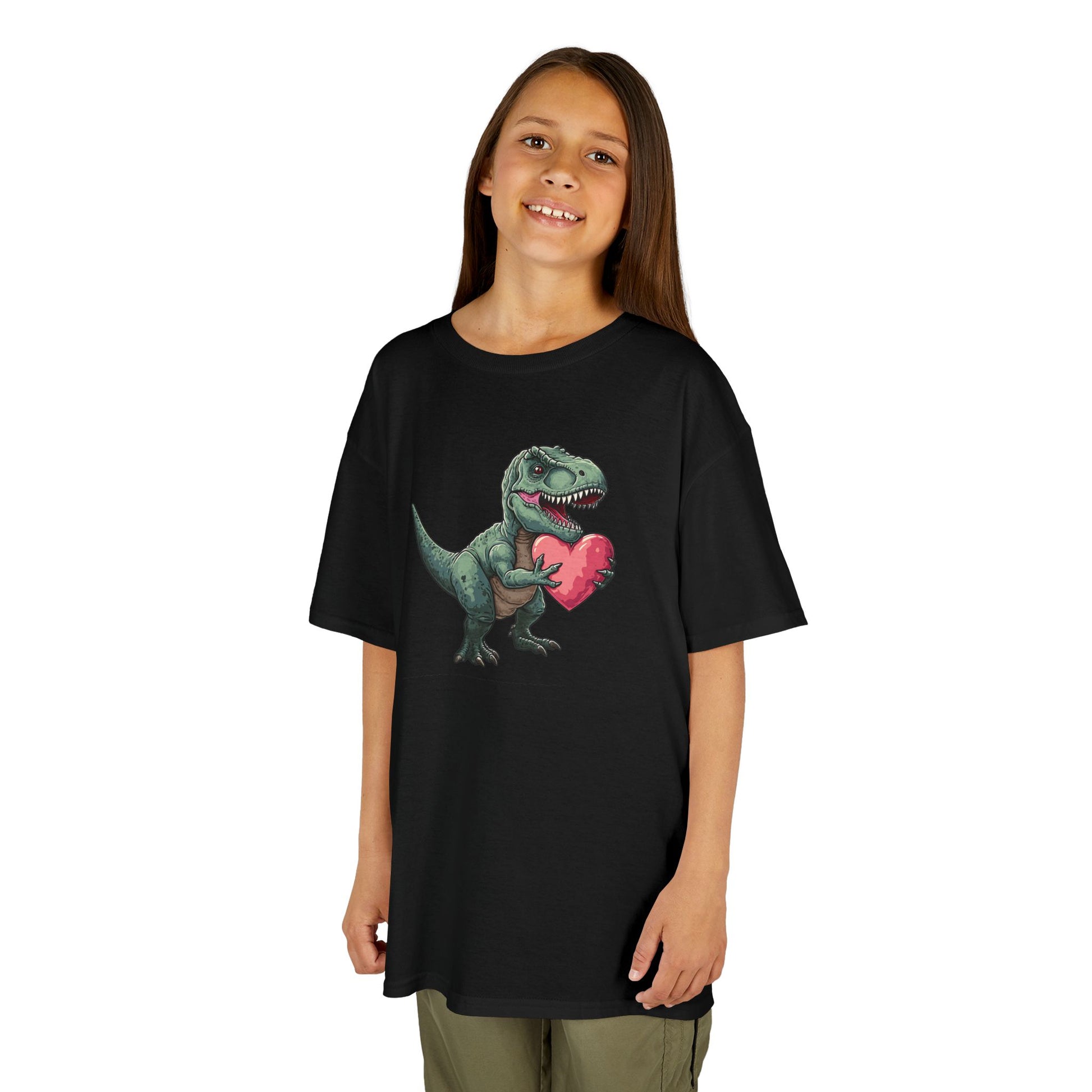 Girl wearing a black T-Rex Love kids T-shirt with a cartoon dinosaur holding a heart. Part of the Vivid Divergence Sensory Friendly Kids Shirts Range. The perfect T-shirt for sensory-sensitive kids and comes with a Sensory Satisfaction Promise.