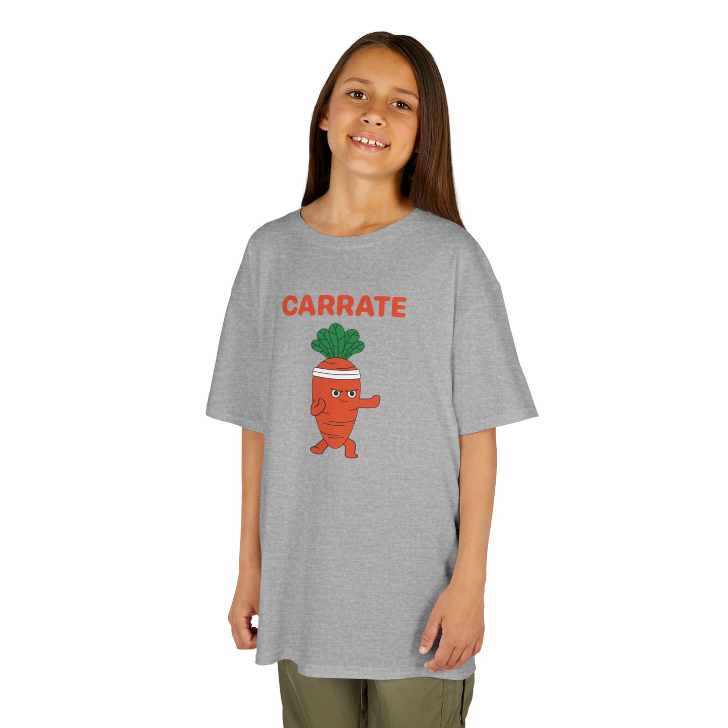 Girl wearing a gray "Carrate" karate carrot kids T-shirt with a cartoon carrot in a karate pose. Part of the Vivid Divergence Sensory Friendly Kids Shirts Range. The perfect T-shirt for sensory-sensitive kids and comes with a Sensory Satisfaction Promise.